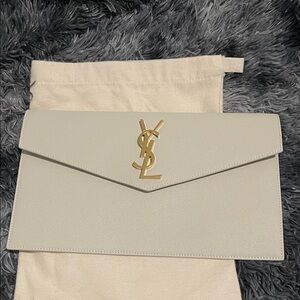 Yves Saint Laurent Ivory Clutch with Gold Logo